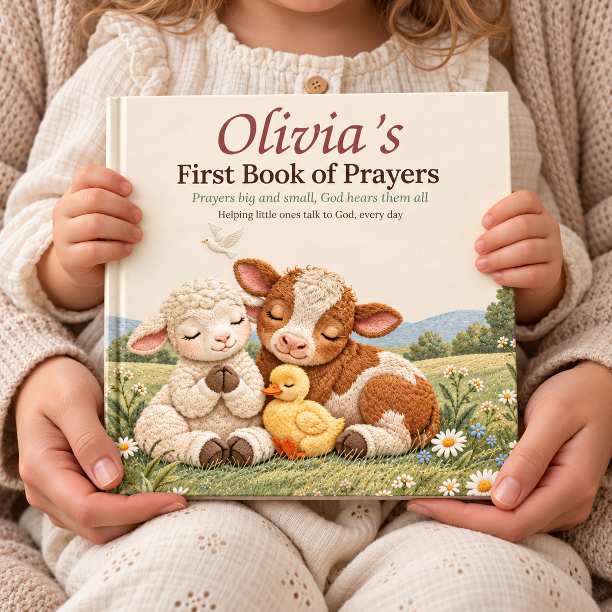 Parent and toddler holding the personalized prayer book